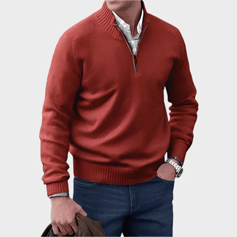 Red half-zip knit sweater with ribbed collar, cuffs, and hem.