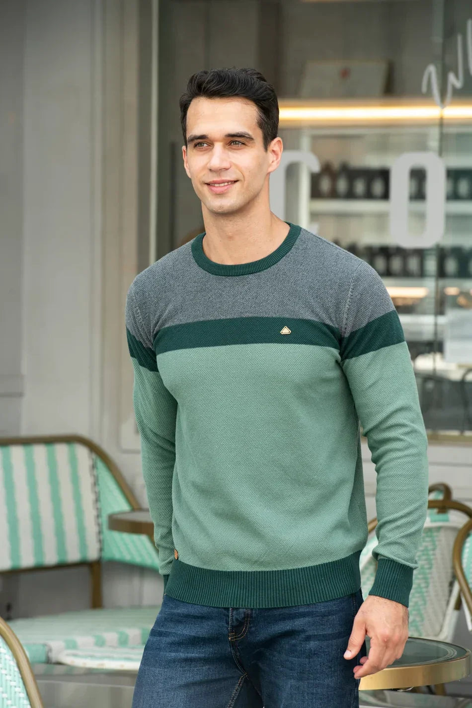 Men's crewneck sweater in green with contrasting banded color blocks