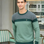 Men's crewneck sweater in green with contrasting banded color blocks