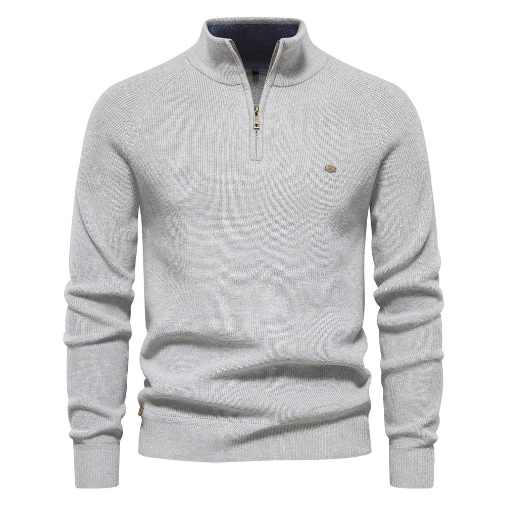 Men's off-white quarter-zip knit pullover with long sleeves, ribbed cuffs, and hem
