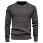 Men's dark gray knit pullover sweater with crew neck, ribbed cuffs and hem, small chest logo.