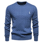 Men's blue cable-knit crewneck sweater with long sleeves and small chest logo