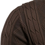 Men's knit cardigan fabric detail in brown, showing raised vertical ribbed texture