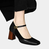 Black leather Mary Jane classic heels with ankle strap and gold buckle