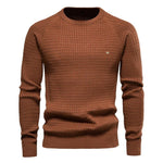 Men's brown knit pullover sweater with crew neck, ribbed cuffs and hem, small chest logo.