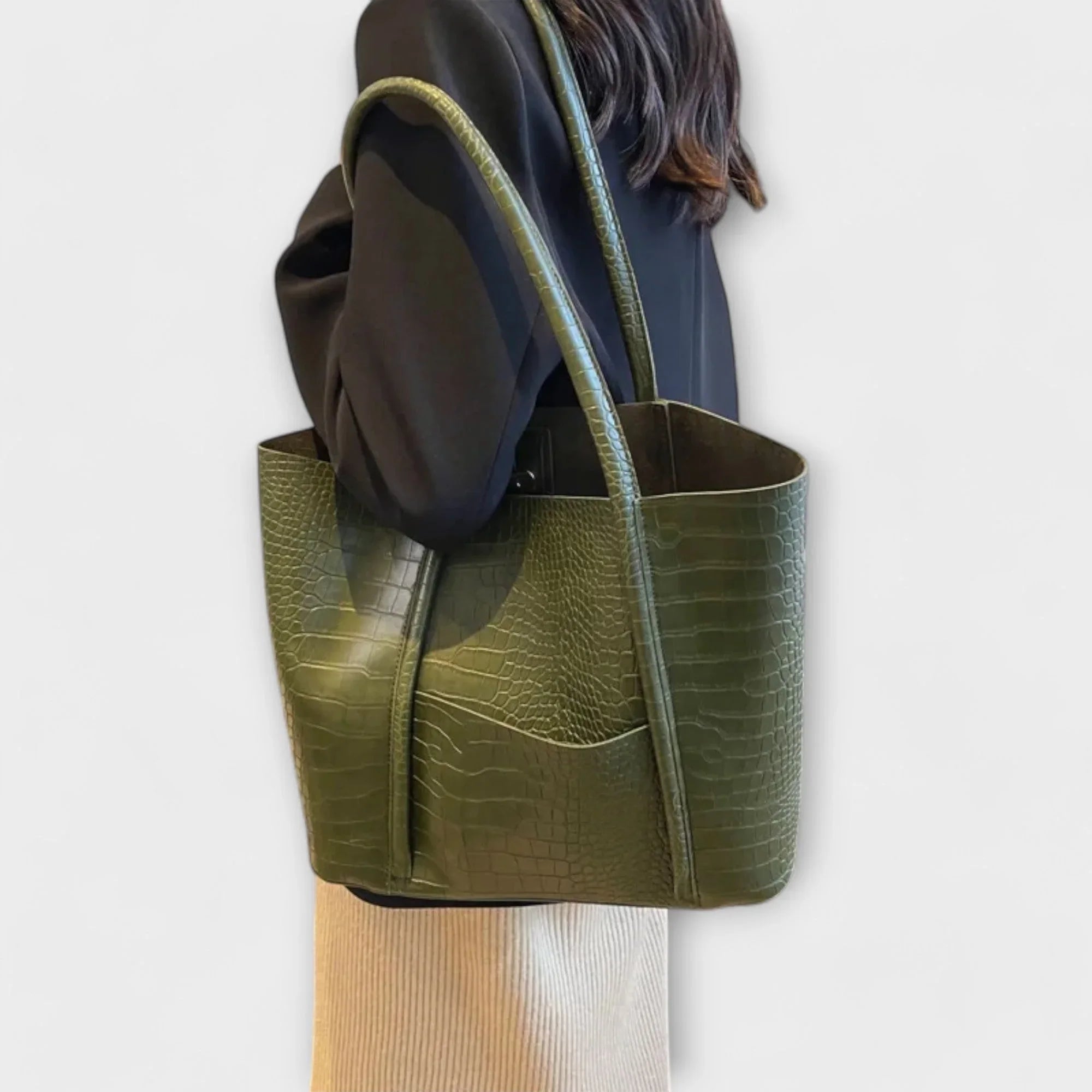 Olive green croc-embossed leather tote bag with wide top handles and open top