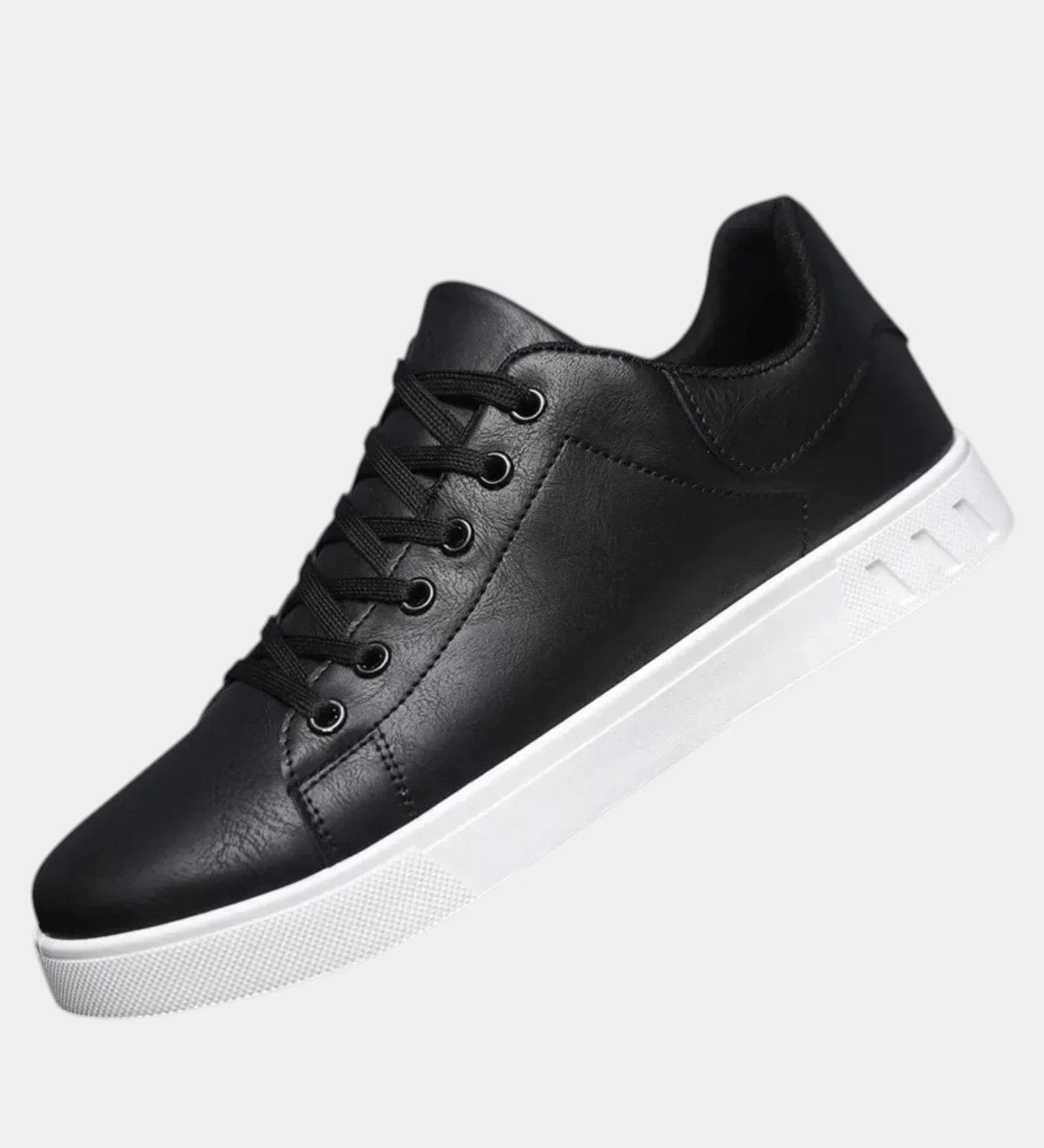 Black orthopedic lace-up shoe with padded collar and white rubber sole