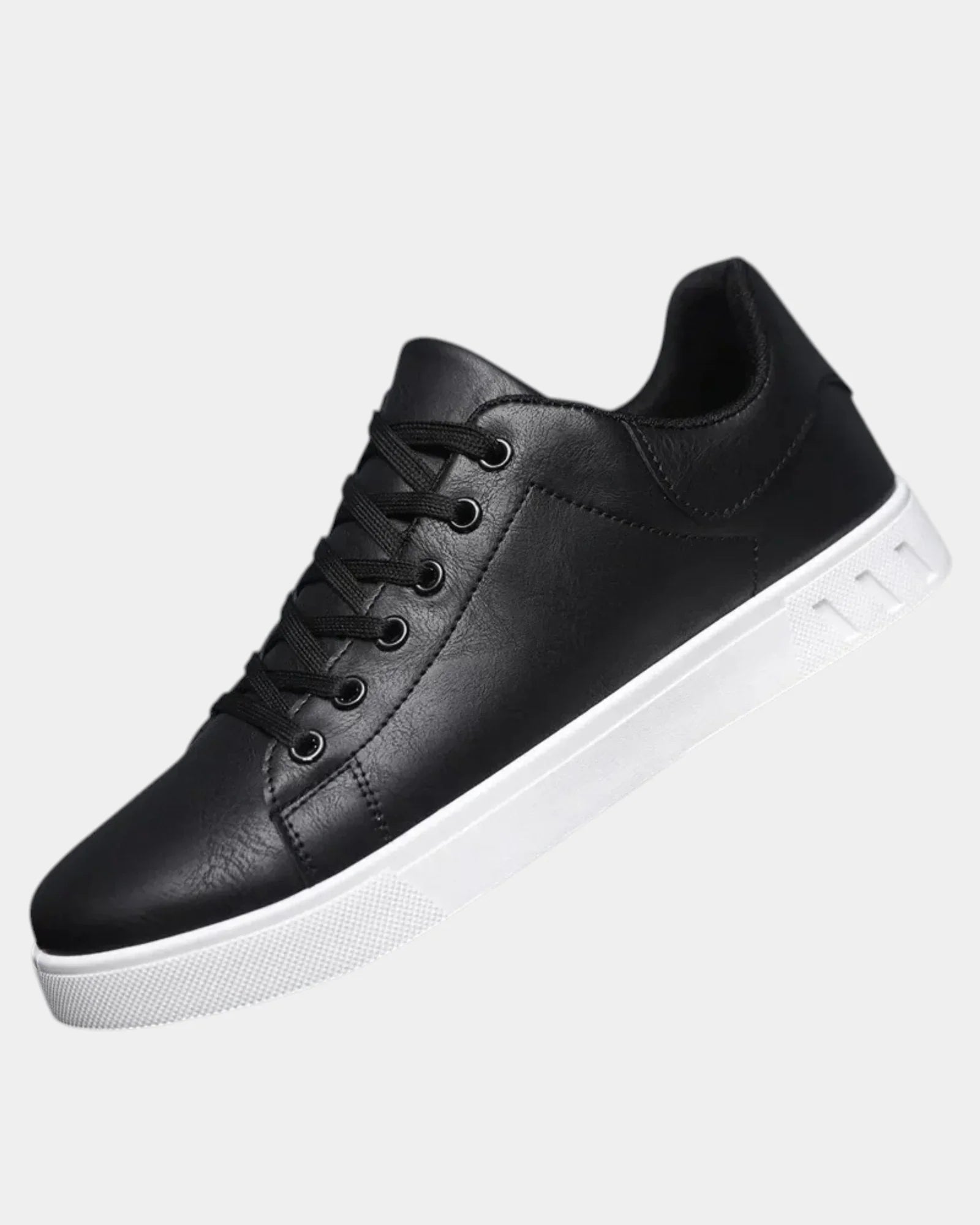 Black orthopedic lace-up shoe with padded collar and white rubber sole