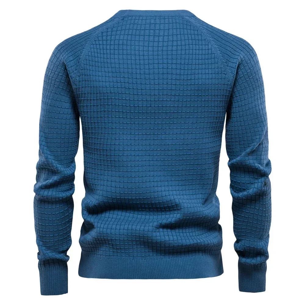 Men's blue knit pullover sweater, crew neck, ribbed cuffs and hem, back view with chest logo.