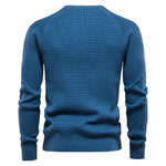 Men's blue knit pullover sweater, crew neck, ribbed cuffs and hem, back view with chest logo.