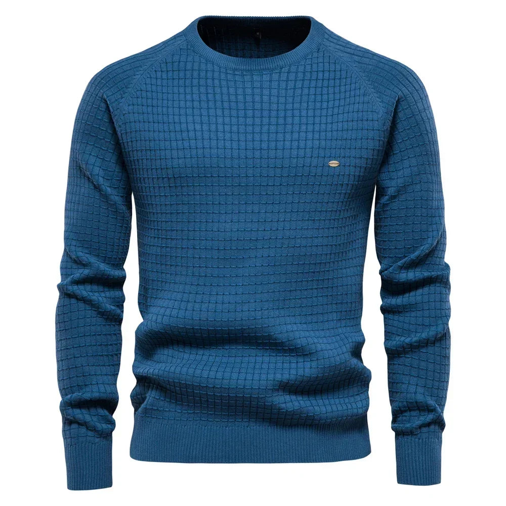 Men's blue knit pullover sweater with crew neck, ribbed cuffs and hem, small chest logo.