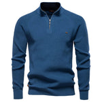 Men's denim blue quarter-zip knit pullover with long sleeves, ribbed cuffs, and hem