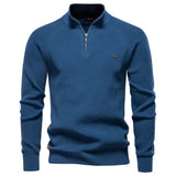 Men's denim blue quarter-zip knit pullover with long sleeves, ribbed cuffs, and hem