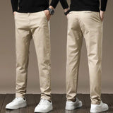 Sand color slim chino pants with button closure, belt loops, tapered legs