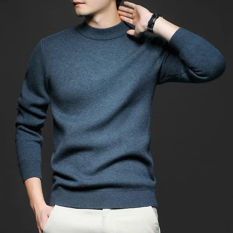 Slate blue high-neck knit sweater with long sleeves and ribbed cuffs.