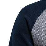 Navy knit sweater sleeve with ribbed texture edge detail