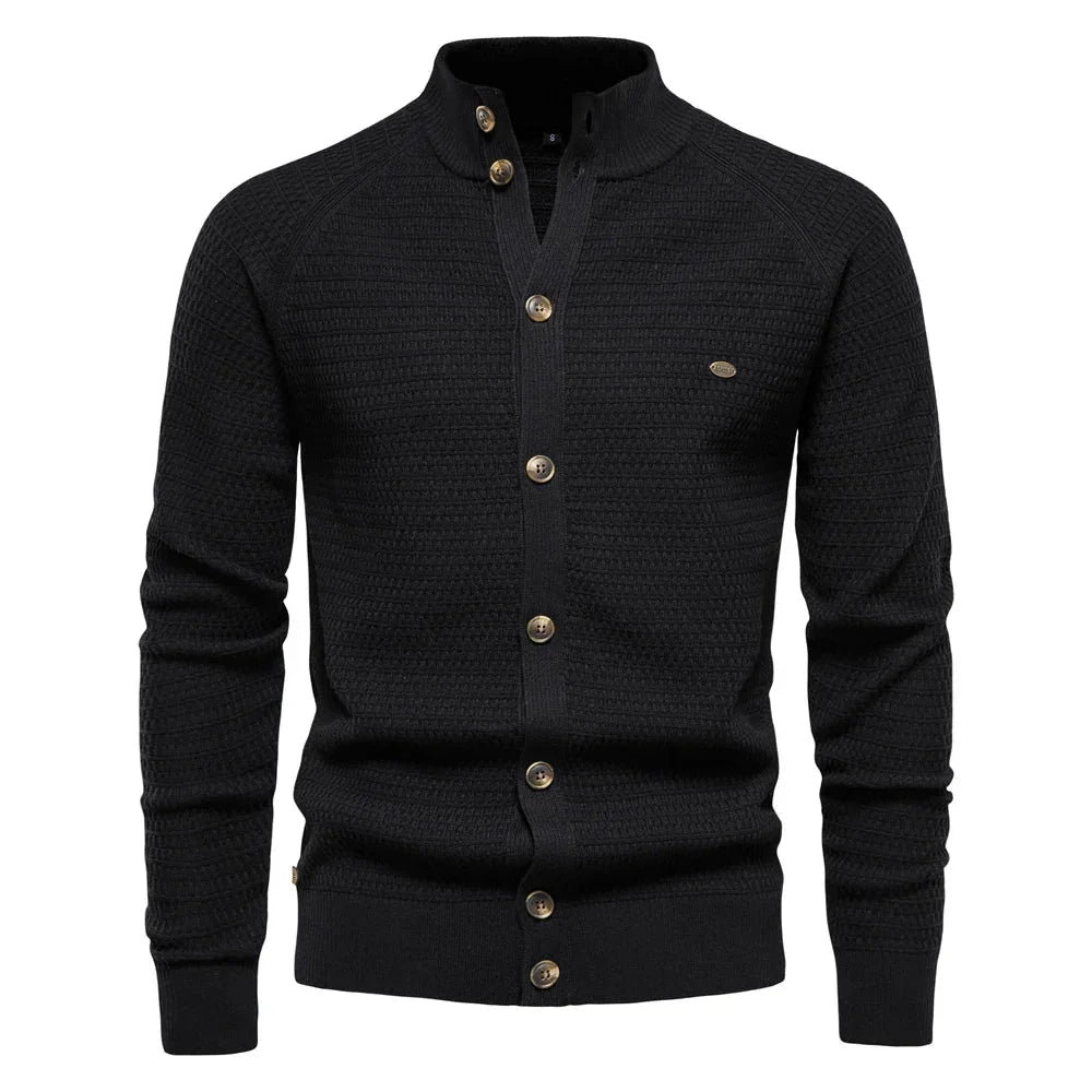 Men's knit jacket in black, button front with stand collar and ribbed hem