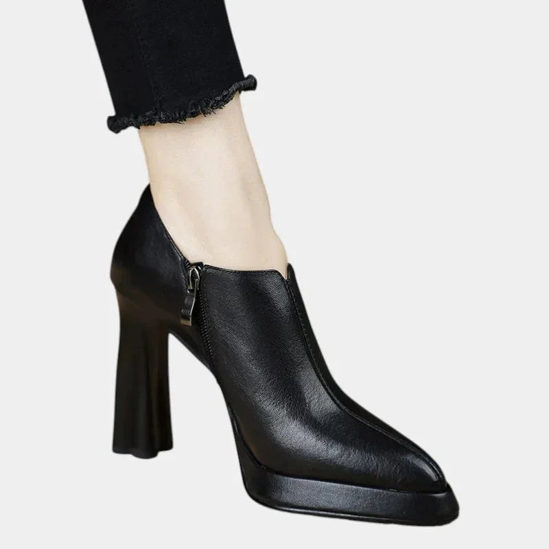 Black heeled ankle boots, pointed toe, side zipper