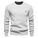 Men's light gray cable-knit crewneck sweater with long sleeves and small chest logo