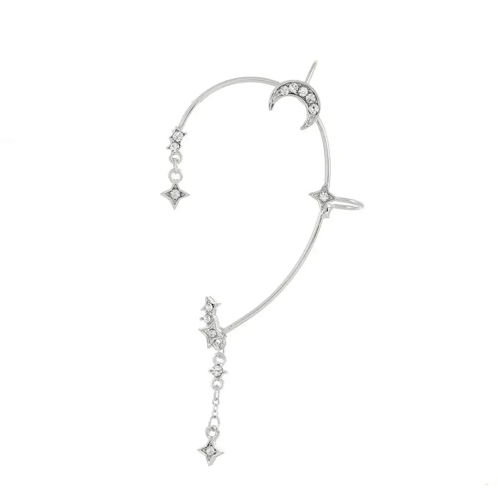 Silver lunar ear cuff with crescent moon, star accents, and dangling star chain