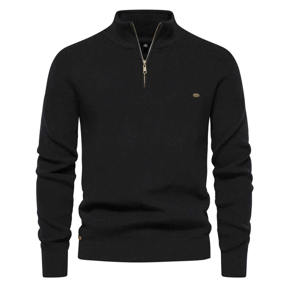 Men's black quarter-zip knit pullover with long sleeves, ribbed cuffs, and hem