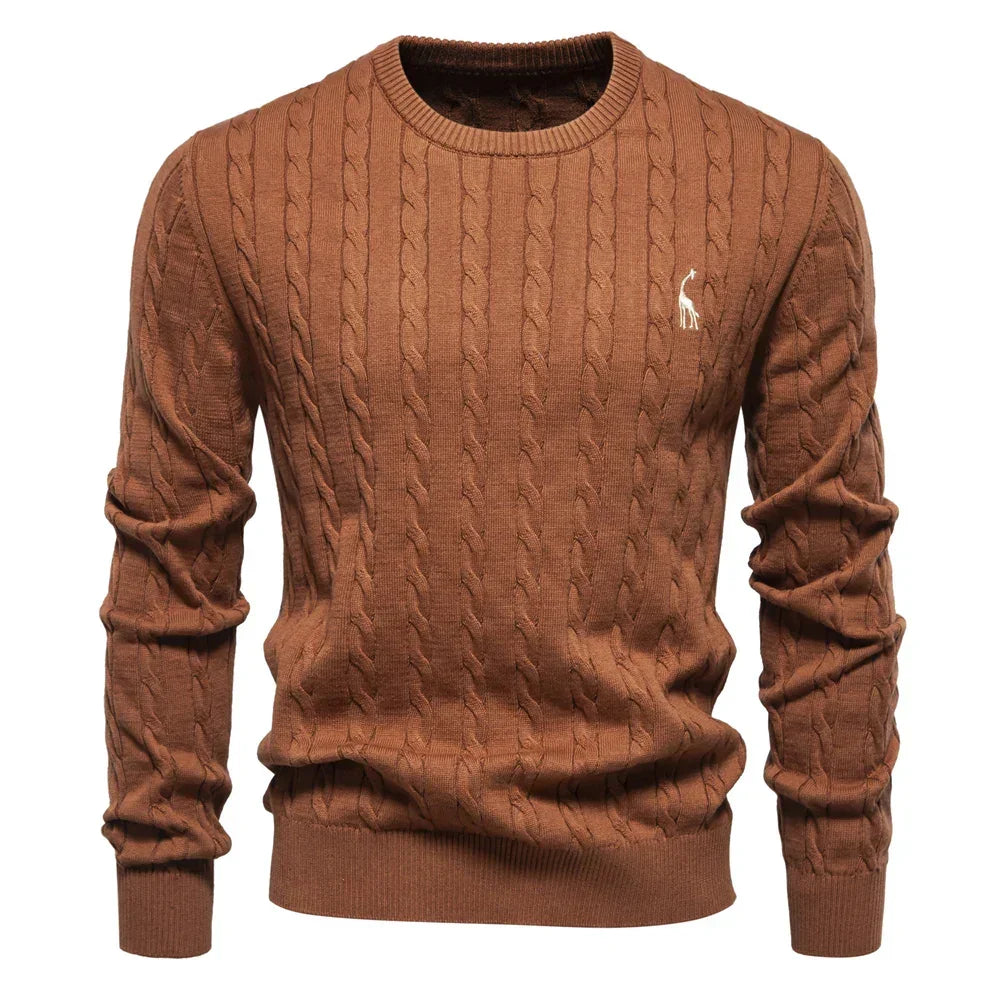Men's brown cable-knit crewneck sweater with long sleeves and small chest logo