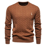Men's brown cable-knit crewneck sweater with long sleeves and small chest logo