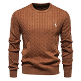 Men's brown cable-knit crewneck sweater with long sleeves and small chest logo