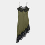 Olive satin slip dress with black lace trim on straps, neckline, and asymmetrical hem
