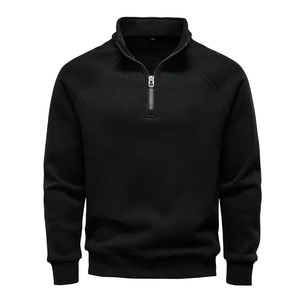 Men's black quarter-zip sweater with stand collar and ribbed cuffs and hem.