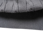 Gray ribbed sweater hem and cuff edge detail