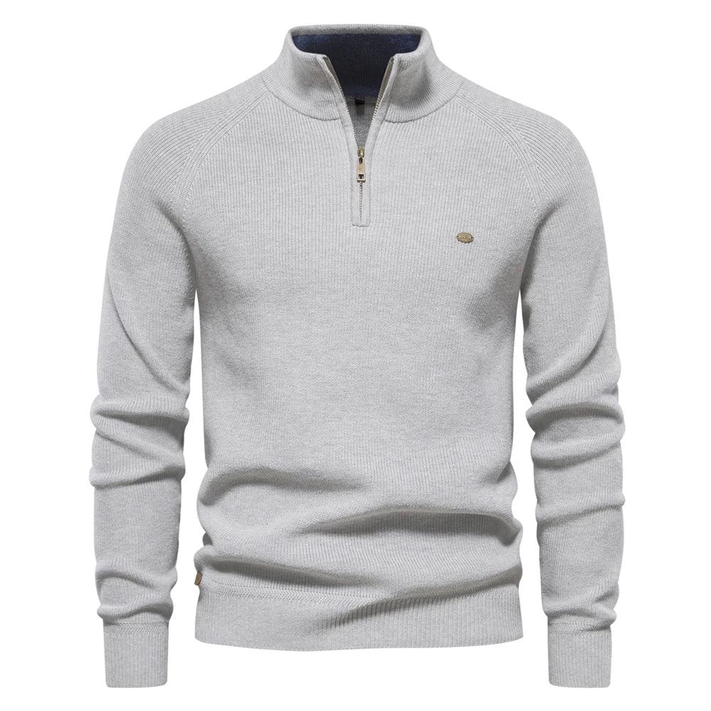 Men's light gray quarter-zip knit pullover with long sleeves, ribbed cuffs, and hem