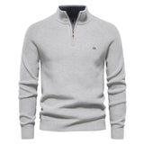 Men's light gray quarter-zip knit pullover with long sleeves, ribbed cuffs, and hem