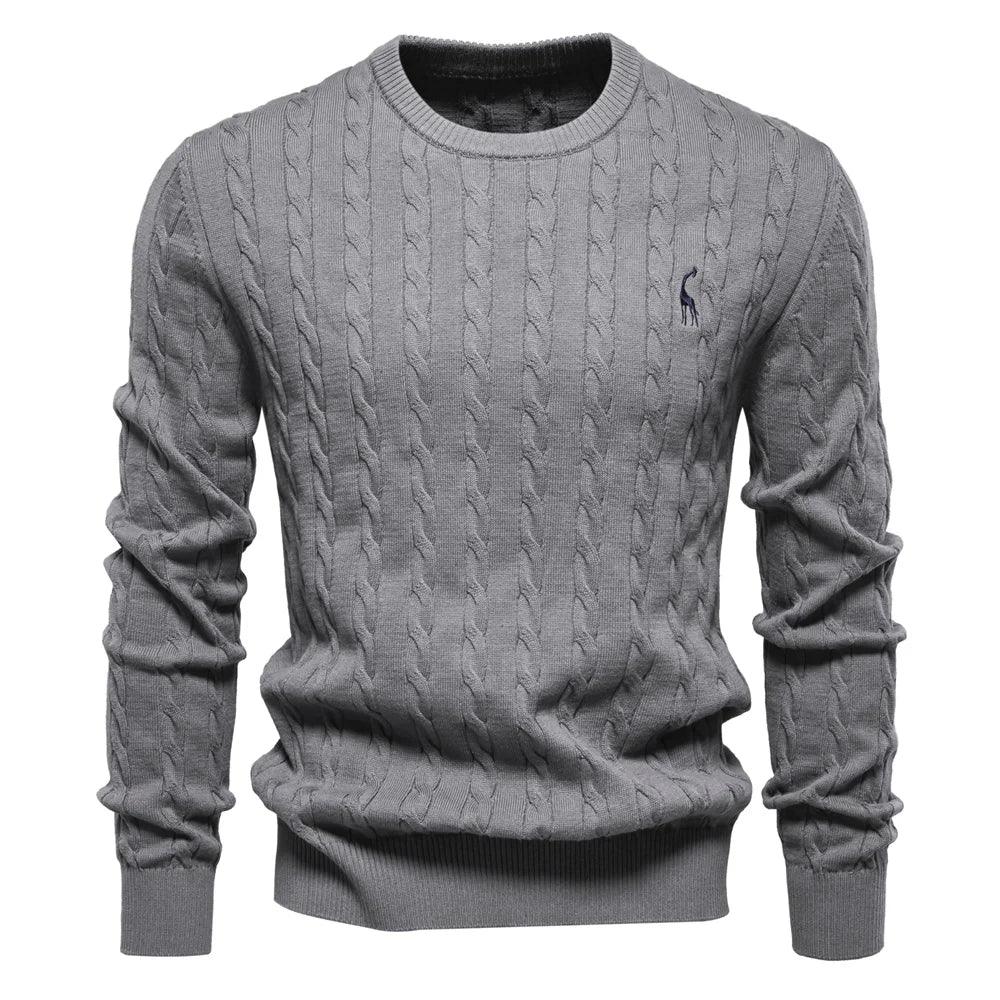 Men's dark gray cable-knit crewneck sweater with long sleeves and small chest logo