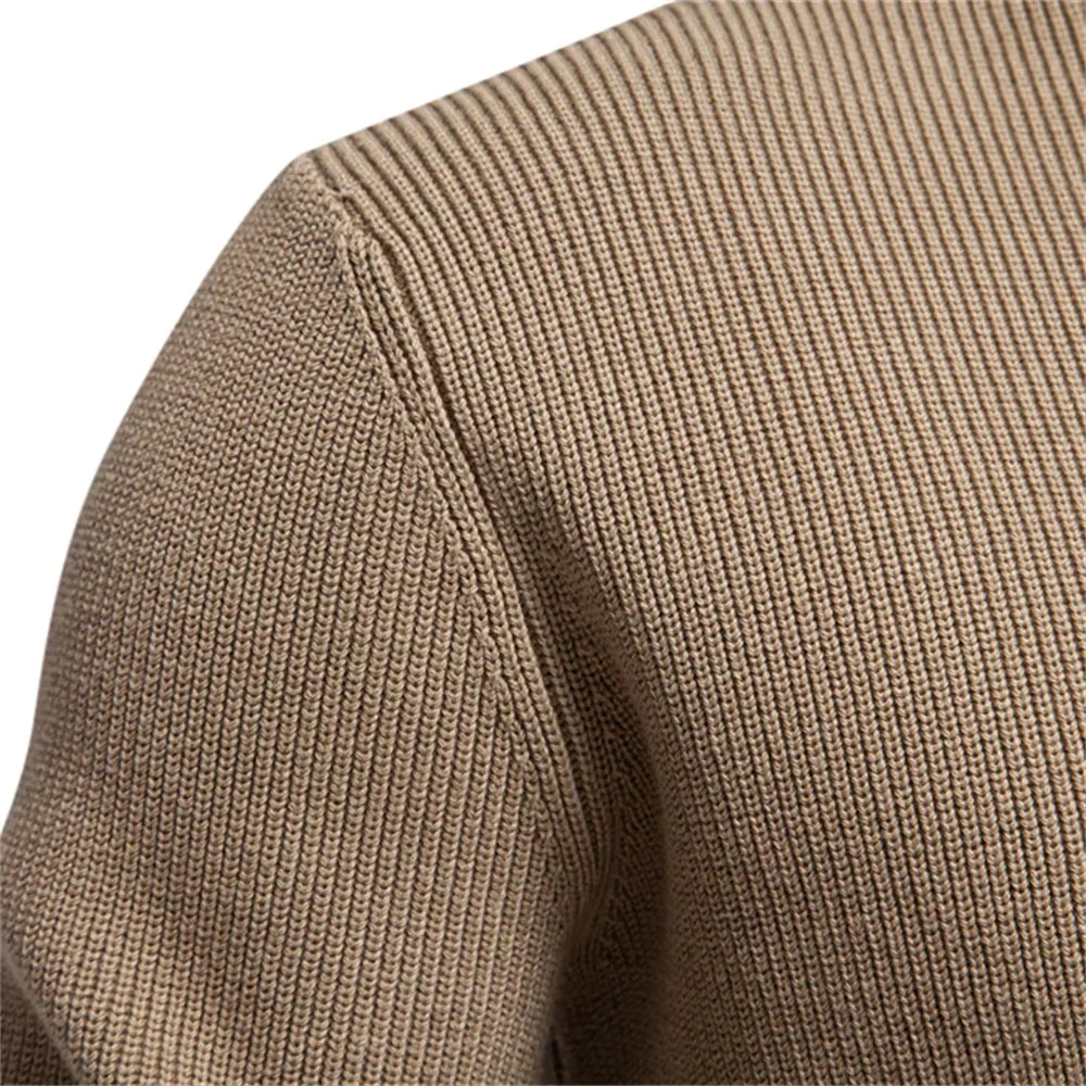 Khaki knit sweater close-up of shoulder seam and textured knit pattern