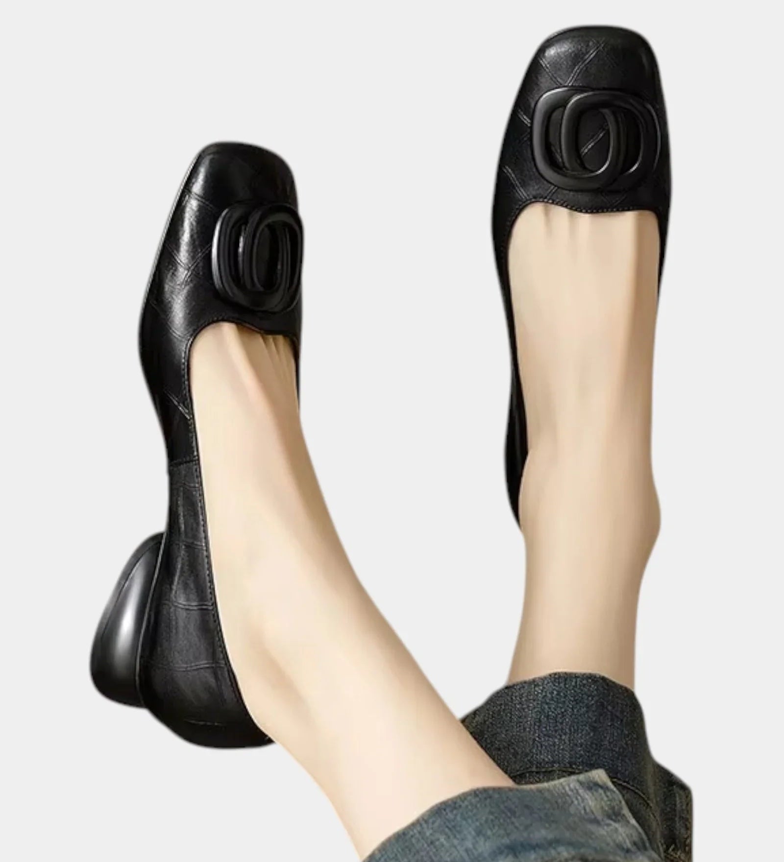 Black leather loafer with oval logo buckle detail, low block heel