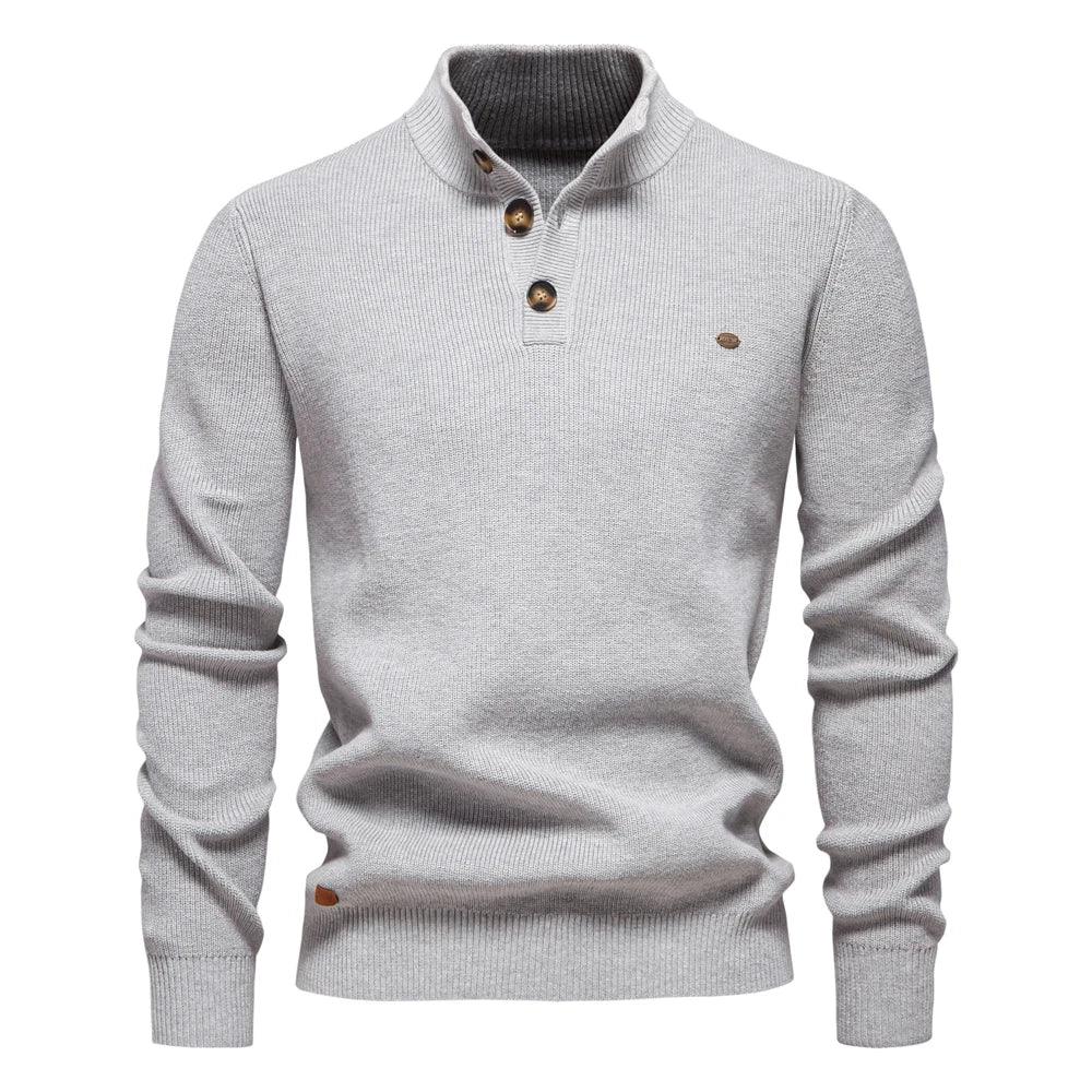 Men's knit sweater in light gray with henley-style button placket and long sleeves