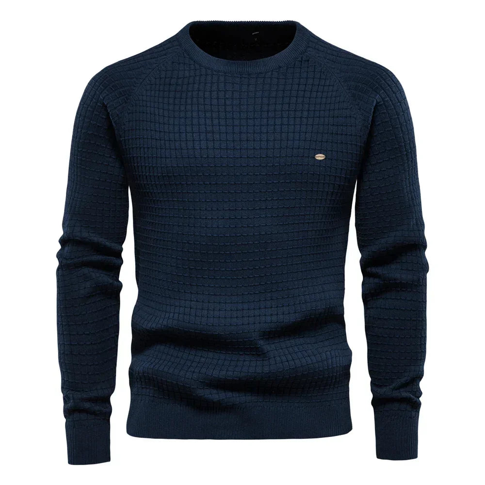 Men's navy blue knit pullover sweater with crew neck, ribbed cuffs and hem, small chest logo.