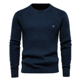 Men's navy blue knit pullover sweater with crew neck, ribbed cuffs and hem, small chest logo.