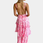 Pink floral tiered maxi dress with crisscross open back and thin straps