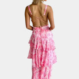 Pink floral tiered maxi dress with crisscross open back and thin straps