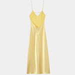 Yellow satin slip dress with V neckline and spaghetti straps, sleeveless floor-length style