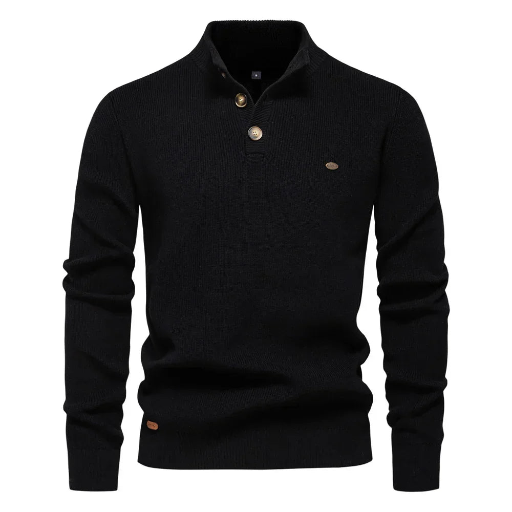 Men's knit sweater in black with henley-style button placket and long sleeves