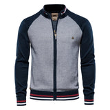 Men's zip-front sweater jacket with navy sleeves and light gray front panel