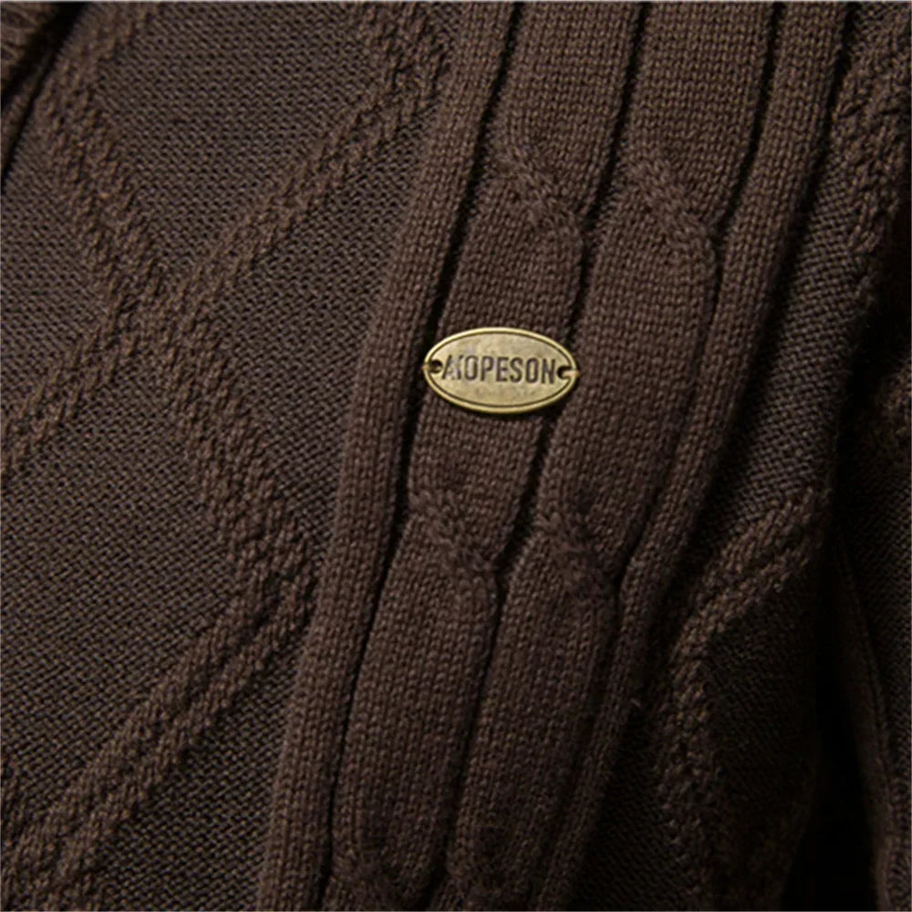 Men's cardigan chest detail in brown with oval brand patch on button placket
