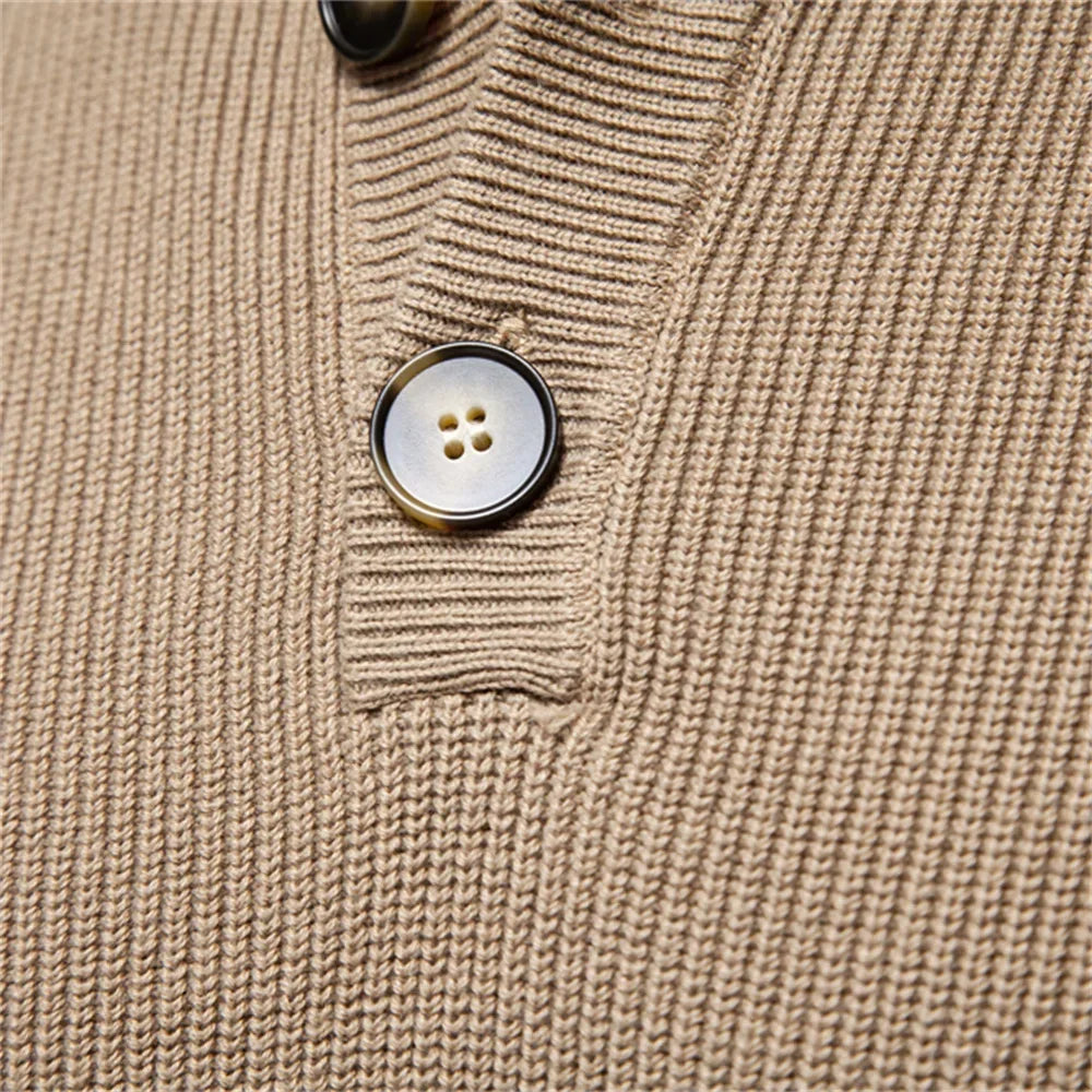 Khaki knit sweater close-up of henley buttons and ribbed collar placket