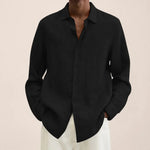 Black linen-look long-sleeve button-up shirt with pointed collar.