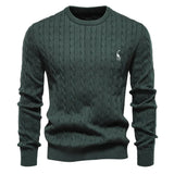 Men's dark green cable-knit crewneck sweater with long sleeves and small chest logo