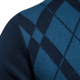 Men's argyle knit sweater detail, blue and dark diamond pattern