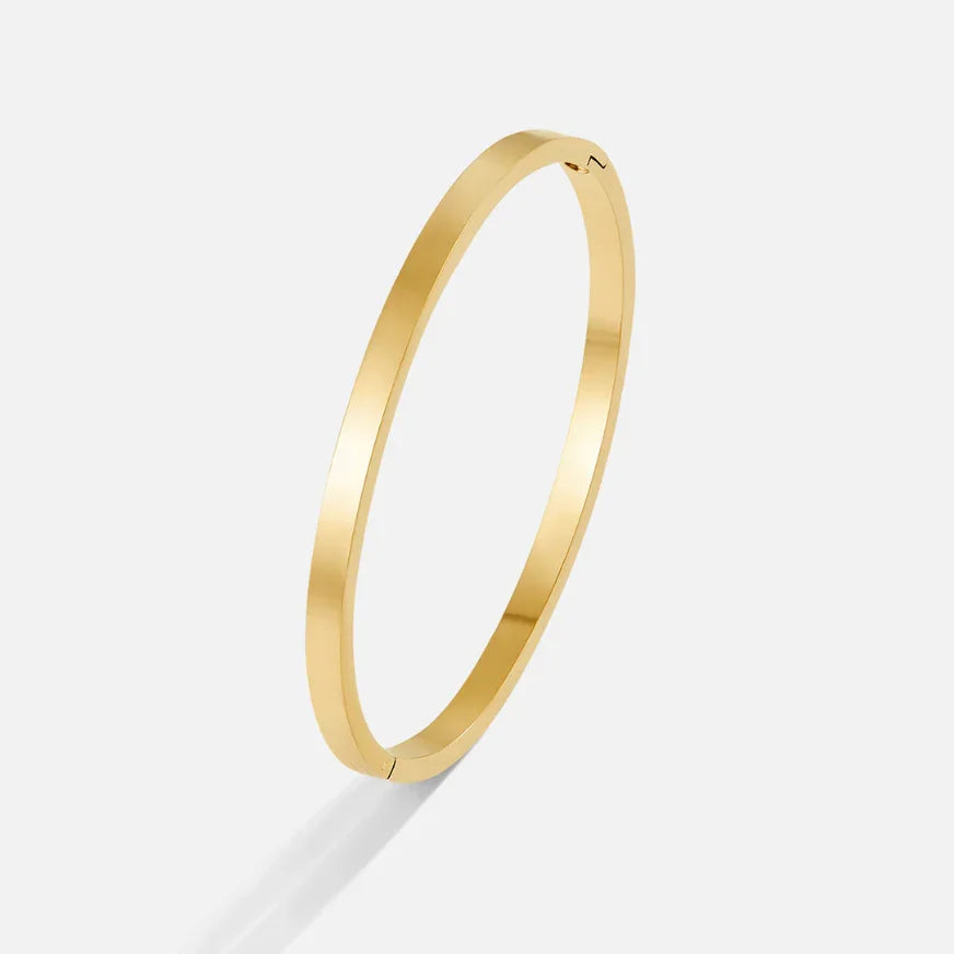 Gold bangle bracelet with smooth polished open cuff